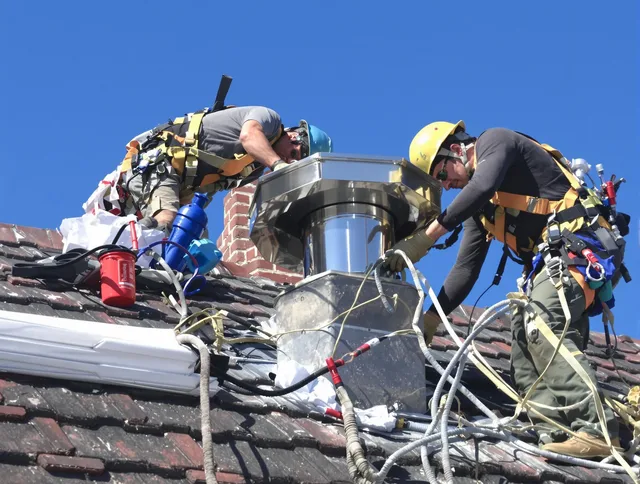 Protective chimney cap installed by Plymouth Chimney Sweep in Plymouth, CT