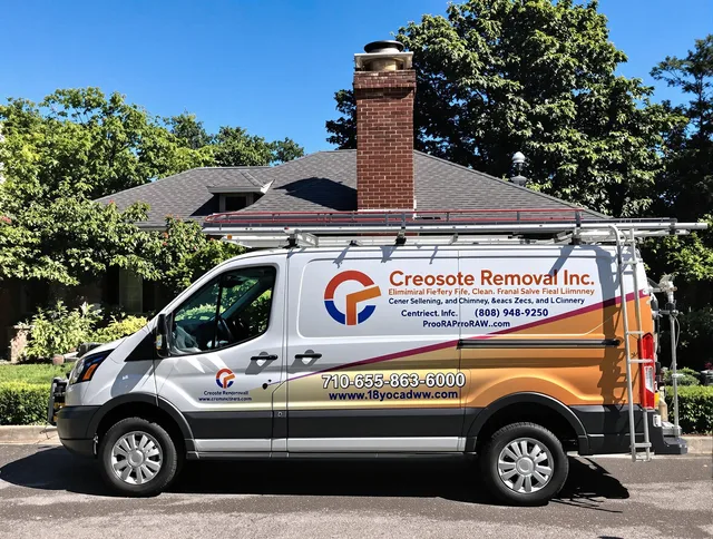 Plymouth Chimney Sweep technician removing creosote safely in Plymouth, CT